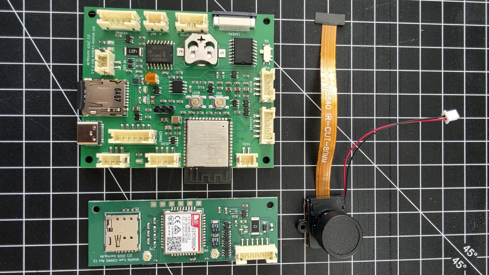 Main board, mobile communication add-on board and camera module of the wildlife camera side by side